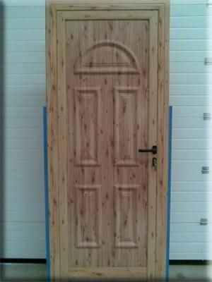 Aluminios J. Ariza puerta de madera